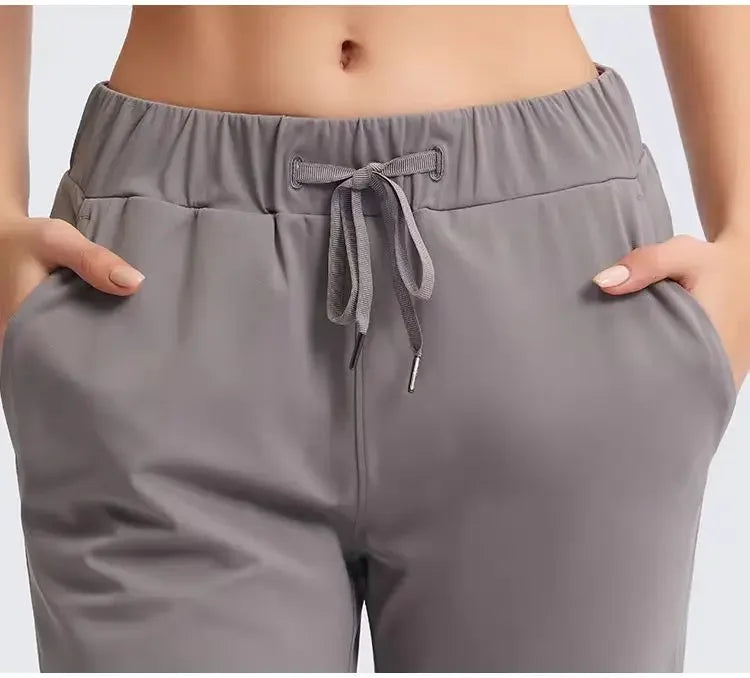 Lemon Women On The Fly Yoga Sport Pants Workout Running Leggings 4 Way Stretch Fabric with Side Pockets Outdoor Gym Trousers