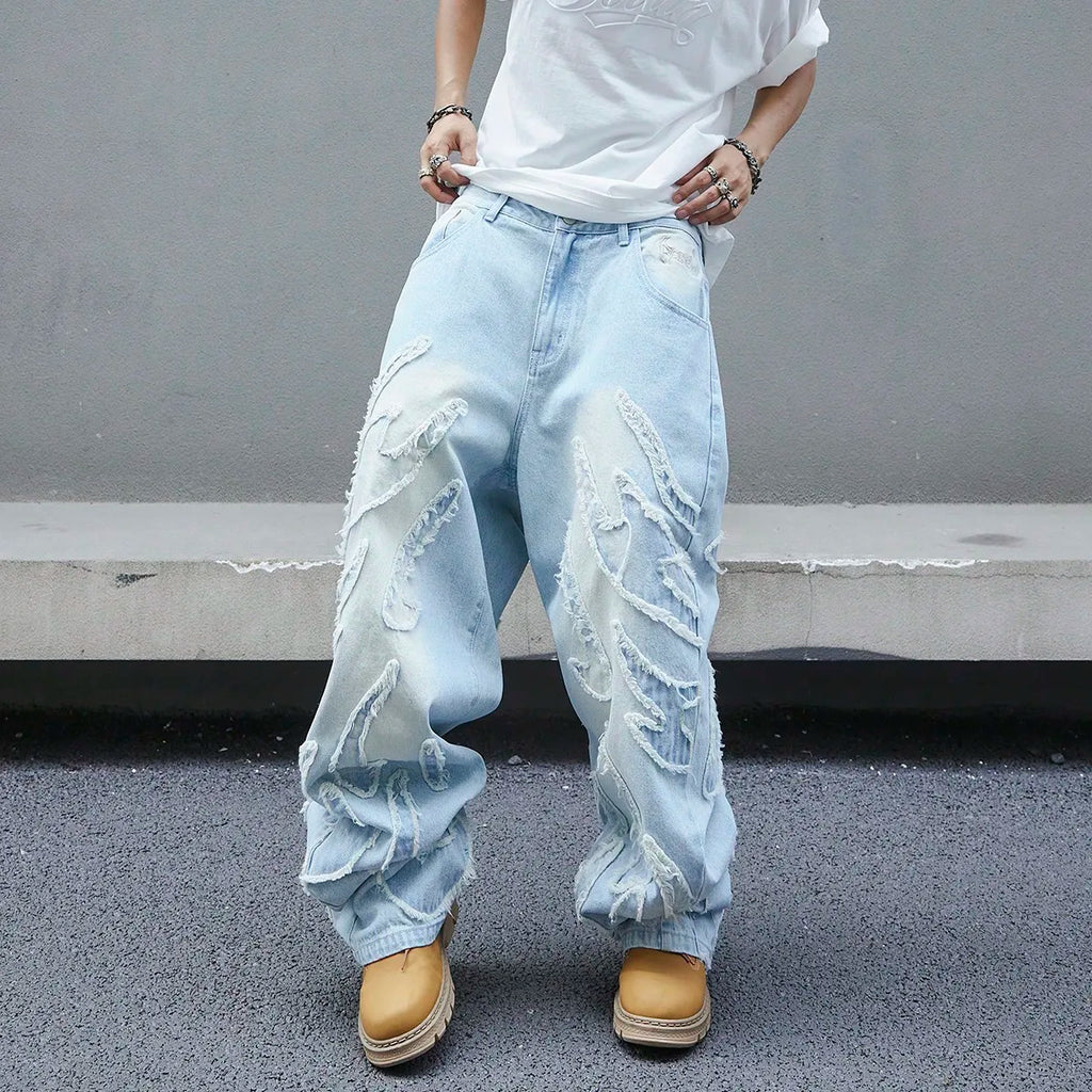 Men's trendy and cool denim wide-leg pants for all seasons featuring unique patchwork patterns, light blue street-stunning style