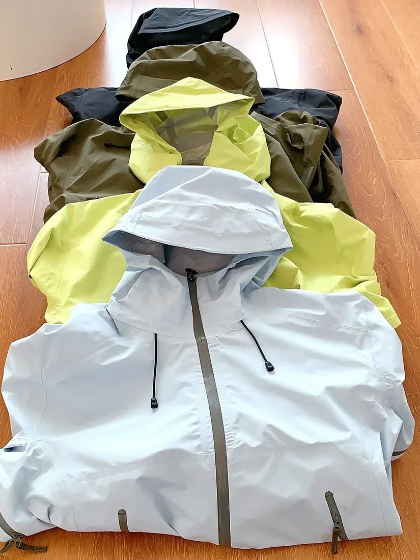 2026 New Storm Jacket Lovers Outdoor Sports Camping Mountain Skiing Trend Fashion British Wind Leisure Waterproof Storm Jacket