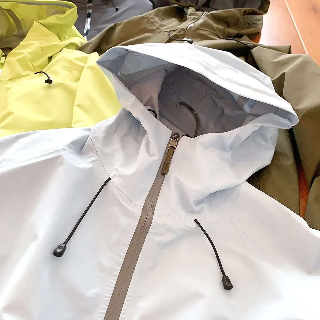 2026 New Storm Jacket Lovers Outdoor Sports Camping Mountain Skiing Trend Fashion British Wind Leisure Waterproof Storm Jacket