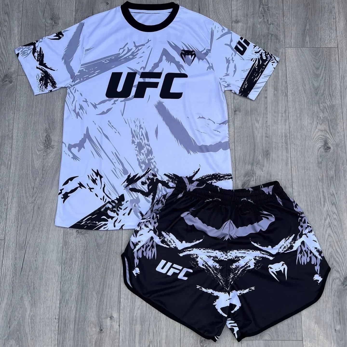 طقم ملاكمة UFC علوي للرجال والنساء كبير الحجم قابل للتنفس سريع الجفاف طقم رياضي MMA للتدريب على القتال والجري شورت بأكمام قصيرة