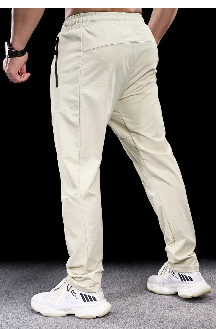 New Autumn Winter Men Quick-drying Sports Casual Trousers Gym Fitness Running Training Clothes Micro-elastic Zipper Pocket Pants