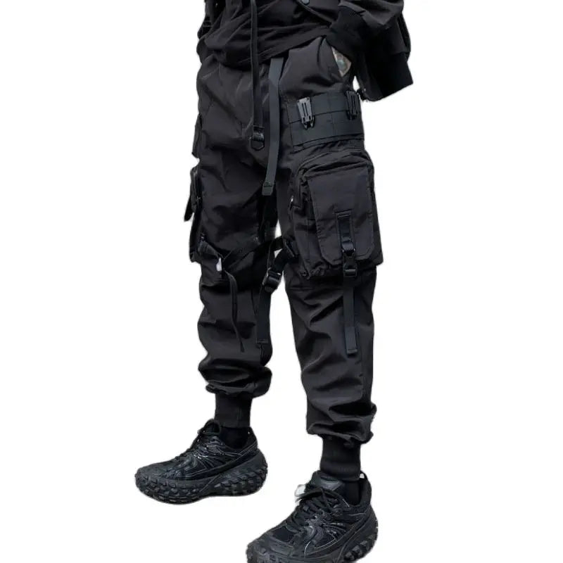 بنطال كارجو تكتيكي بتقنية techwear متعدد الجيوب وربطات وشريط
