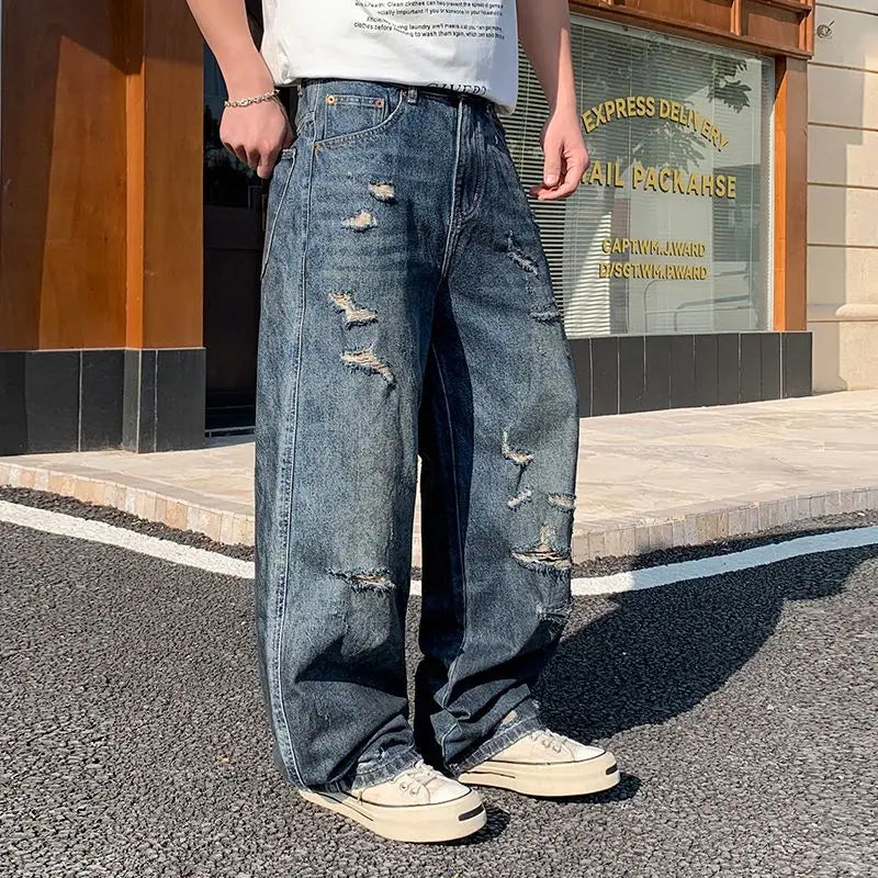 American-style distressed wide-leg jeans, loose-fitting washed and distressed straight-leg jeans, trendy brand.