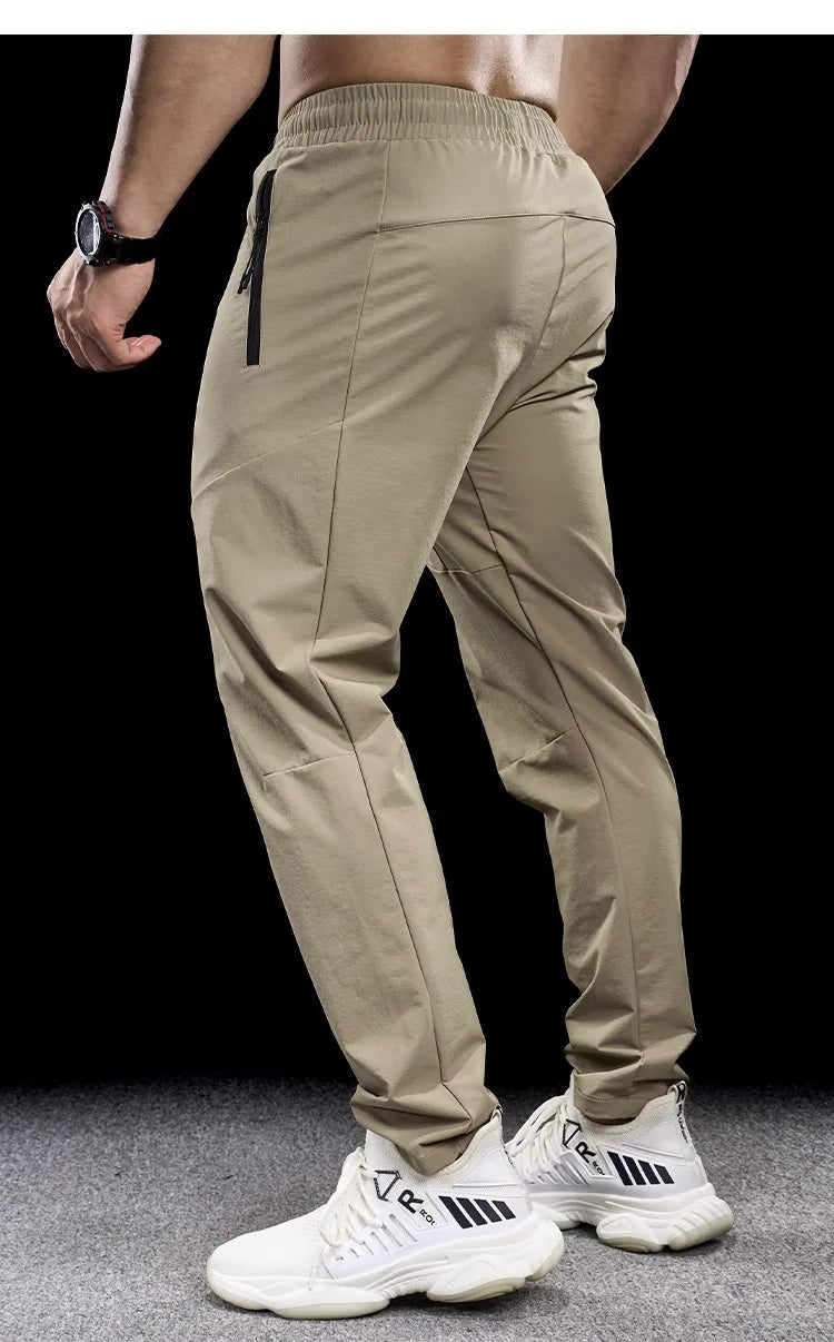 New Autumn Winter Men Quick-drying Sports Casual Trousers Gym Fitness Running Training Clothes Micro-elastic Zipper Pocket Pants