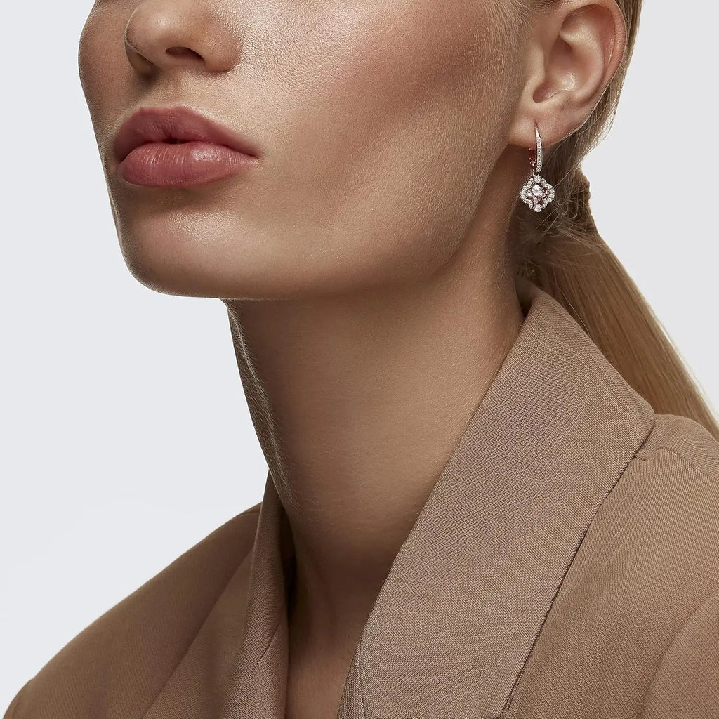 Una Pierced Earrings with Clear Crystal Pavé Surrounding a Pink Stone on a Rose-Gold Tone Finished Setting