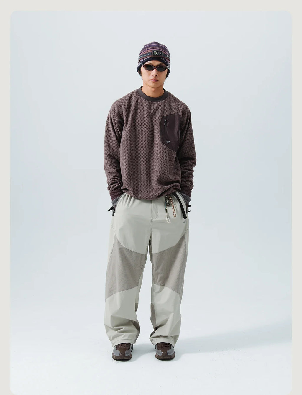 Mountain-Ready Crewneck: Engineered with Ribbed Neck, Reflective Logo, & Secure Chest Pocket for Outdoor Style Unisex